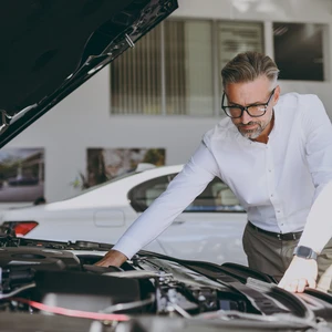 A Professional Working In The Motor Trade Industry