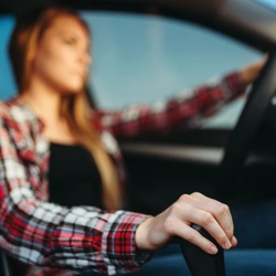 a young woman driving