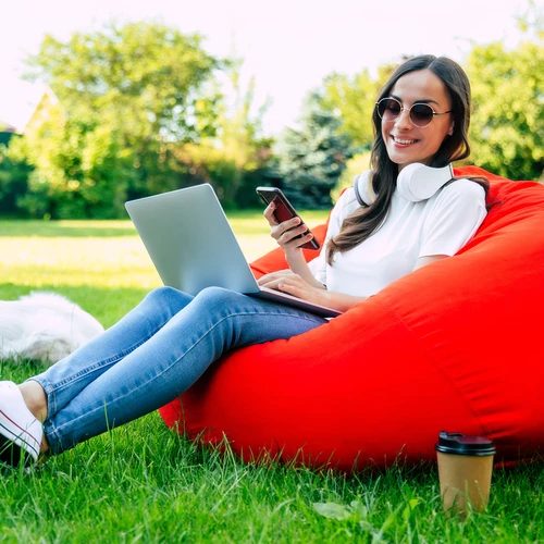 A Student Relaxing With Some Of Their Possessions