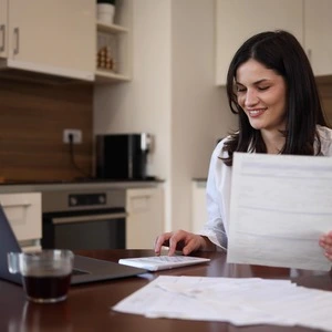 A student reviewing their student insurance documentation