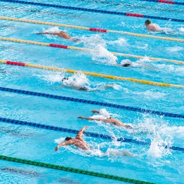 Swimmers In A Leisure Club Swimming Pool