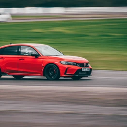 A Car Racing Around A Track