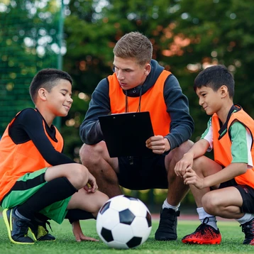 A Football Coach Managing Two Players